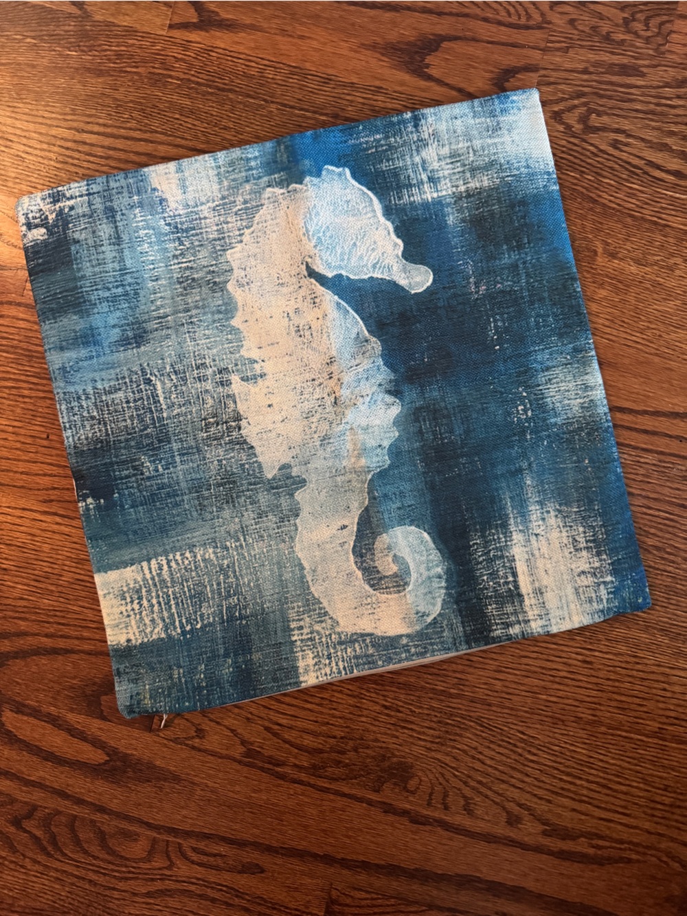 Seahorse Print pillow cover on teal-blue background 18x18